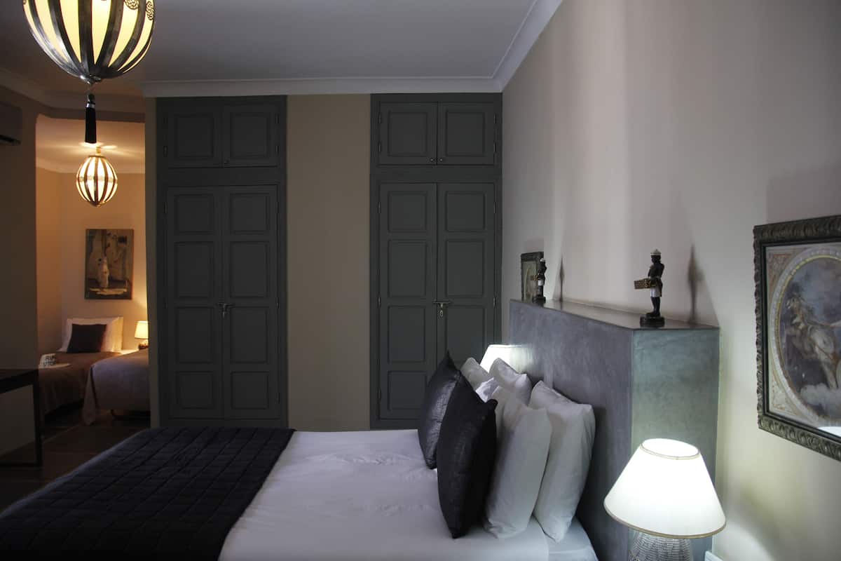 Family Suite | Premium bedding, in-room safe, individually decorated, desk