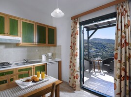 Apartment, 1 Bedroom, Sea View | Private kitchenette | Fridge, coffee/tea maker, electric kettle