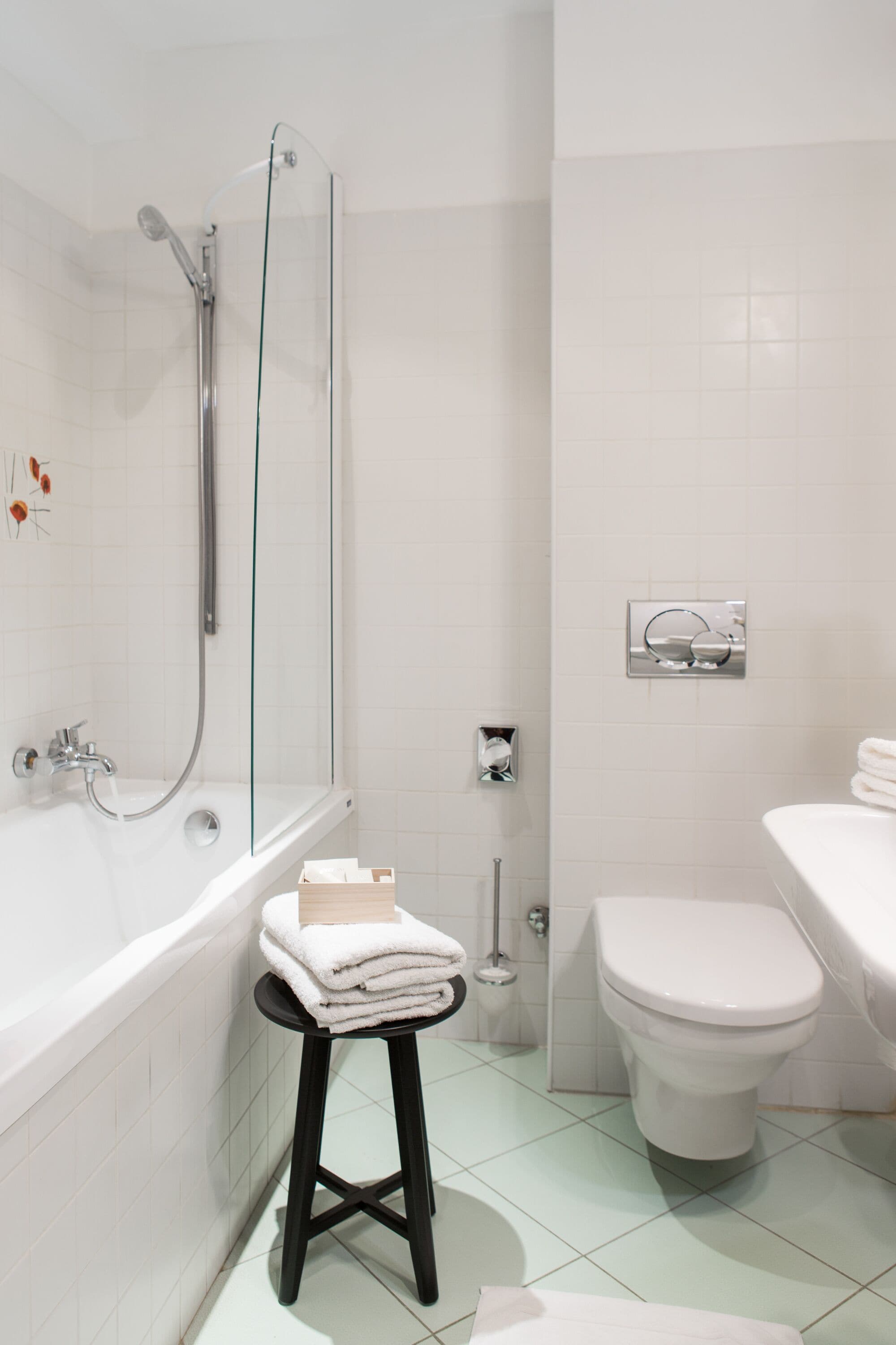 junior suite | bathroom | hair dryer, dressing gowns, towels