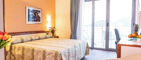 Panoramic Double Room Single Use, Sea View | Down duvets, minibar, in-room safe, desk