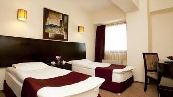 Double or Twin Room with Extra Bed | Minibar, in-room safe, desk, iron/ironing board