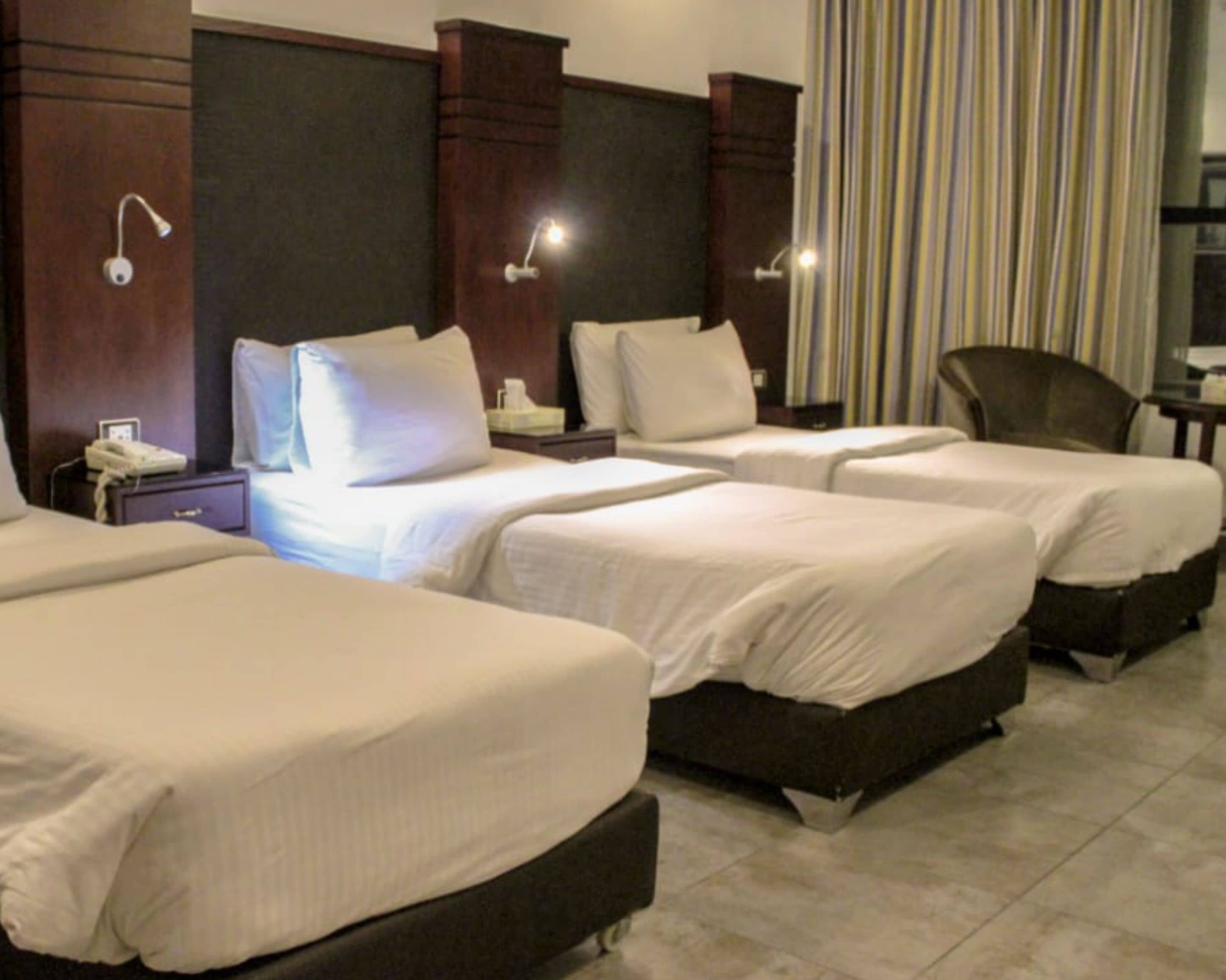 ห้องสแตนดาร์ดทริปเปิล, เตียงเดี่ยว 3 เตียง | เครื่องนอนป้องกันสารก่อภูมิแพ้, มินิบาร์, ตู้นิรภัยในห้องพัก