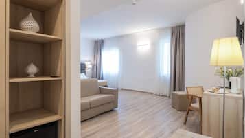 Suite Studio | Couette en duvet d'oie, minibar, coffres-forts dans les chambres, bureau