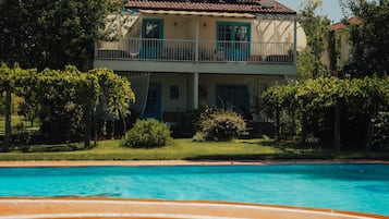 Seasonal outdoor pool, open 9:00 AM to 7:00 PM, sun loungers