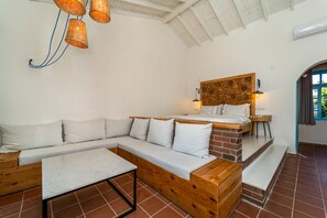 Superior Double Room, Jetted Tub, Sea View | Living area | LCD TV, table tennis, books