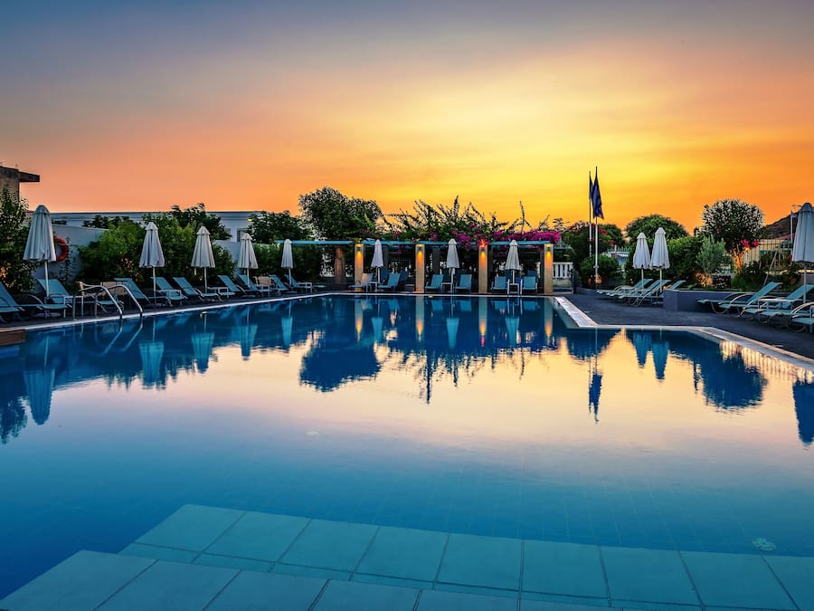 Seasonal outdoor pool, pool umbrellas, sun loungers