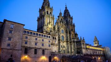A historic cathedral with intricate architecture and a prominent bell tower.