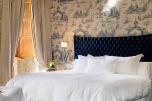 Egyptian cotton sheets, premium bedding, down duvets, memory-foam beds