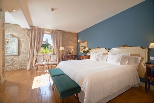 Egyptian cotton sheets, premium bedding, down duvets, memory-foam beds