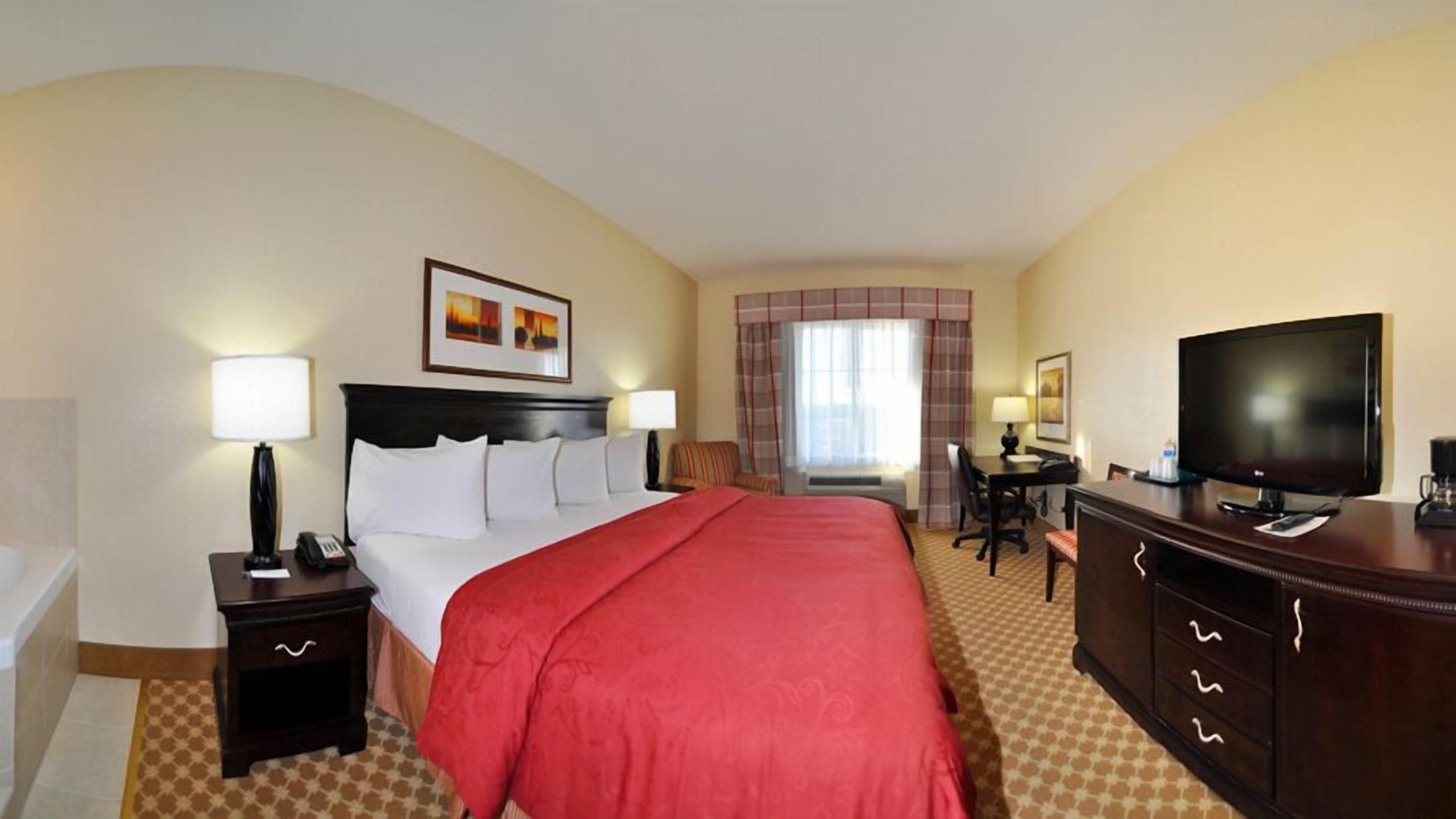 premium bedding, down duvets, desk, blackout curtains