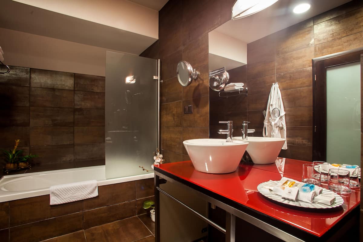 bathtub, free toiletries, hair dryer, bathrobes