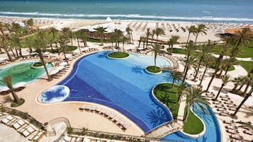 2 outdoor pools, open 8 AM to 7 PM, pool umbrellas, sun loungers