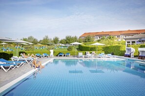 Indoor pool, outdoor pool, open 7:00 AM to 9:00 PM, pool umbrellas