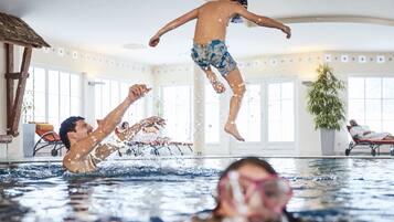 Indoor pool, seasonal outdoor pool, pool umbrellas, pool loungers