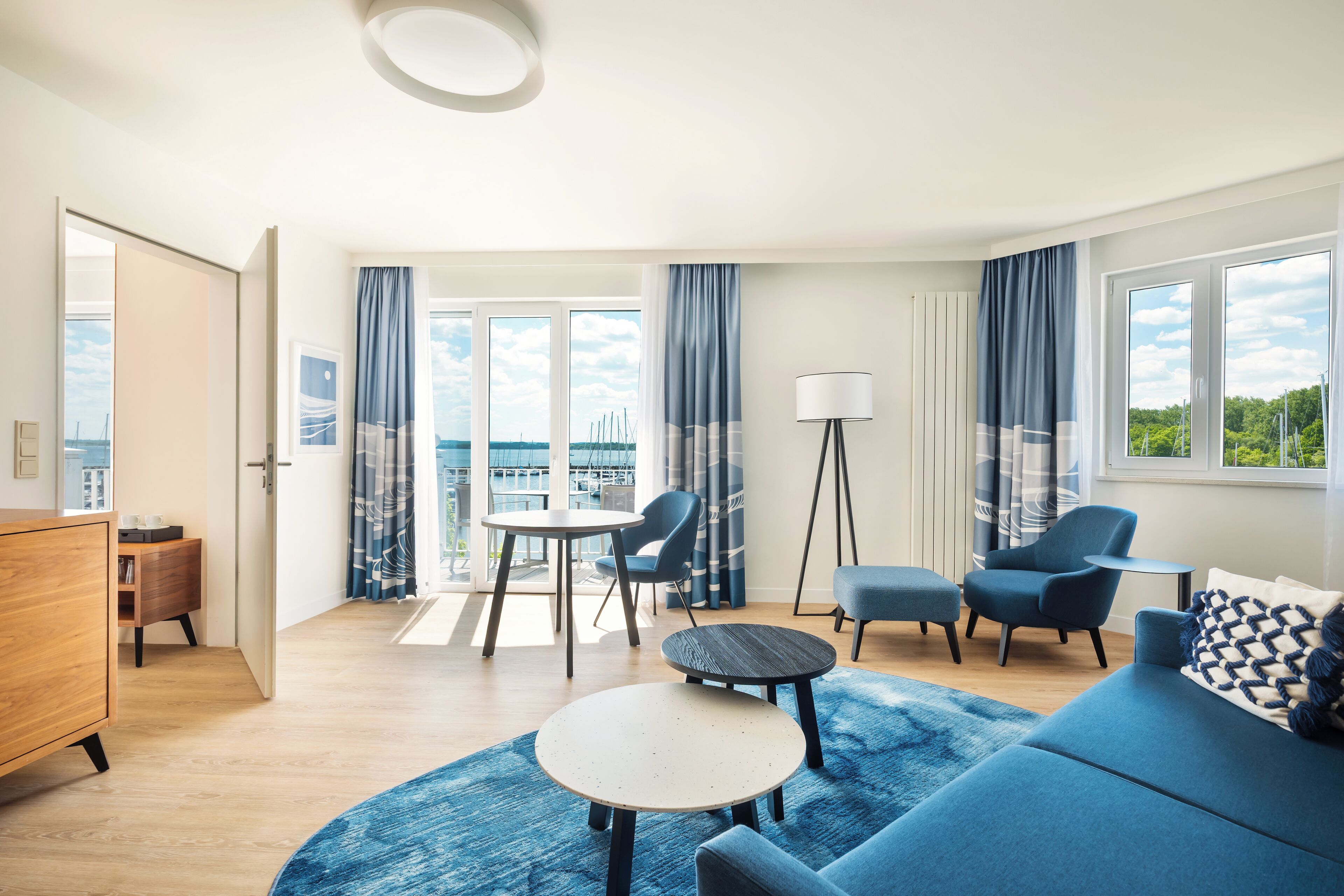 executive suite, sea view | living area | 55-inch flat-screen tv with cable channels, tv