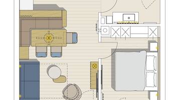 Plano de un cuarto de hotel con kitchenette, zona de comedor, baño y balcón.