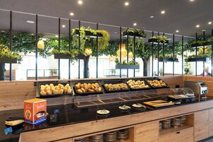 Daily buffet breakfast (EUR 22 per person)
