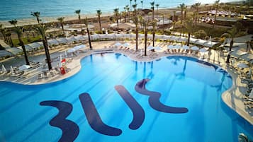Outdoor pool, pool umbrellas, pool loungers