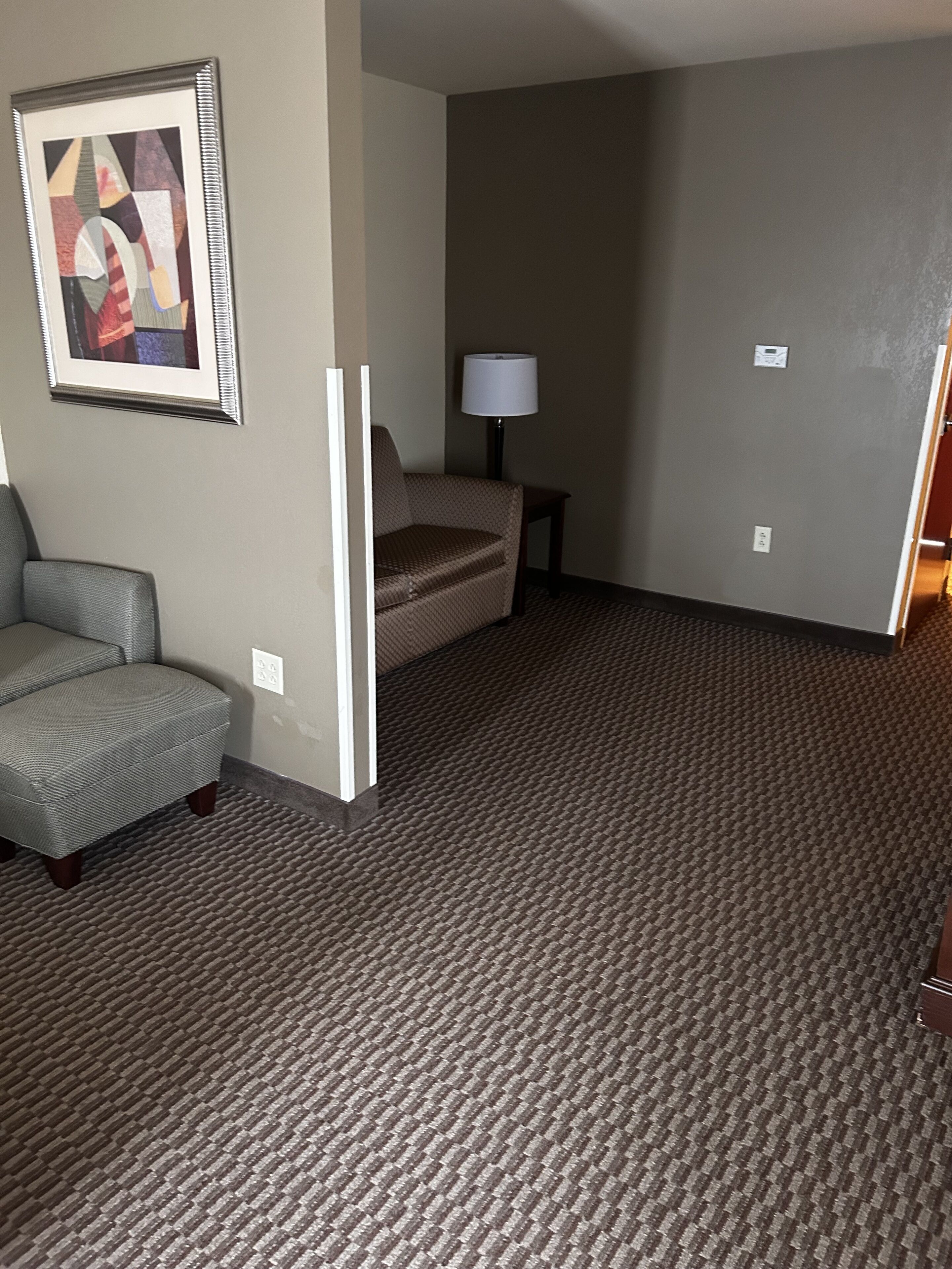 pillow-top beds, desk, laptop workspace, blackout curtains