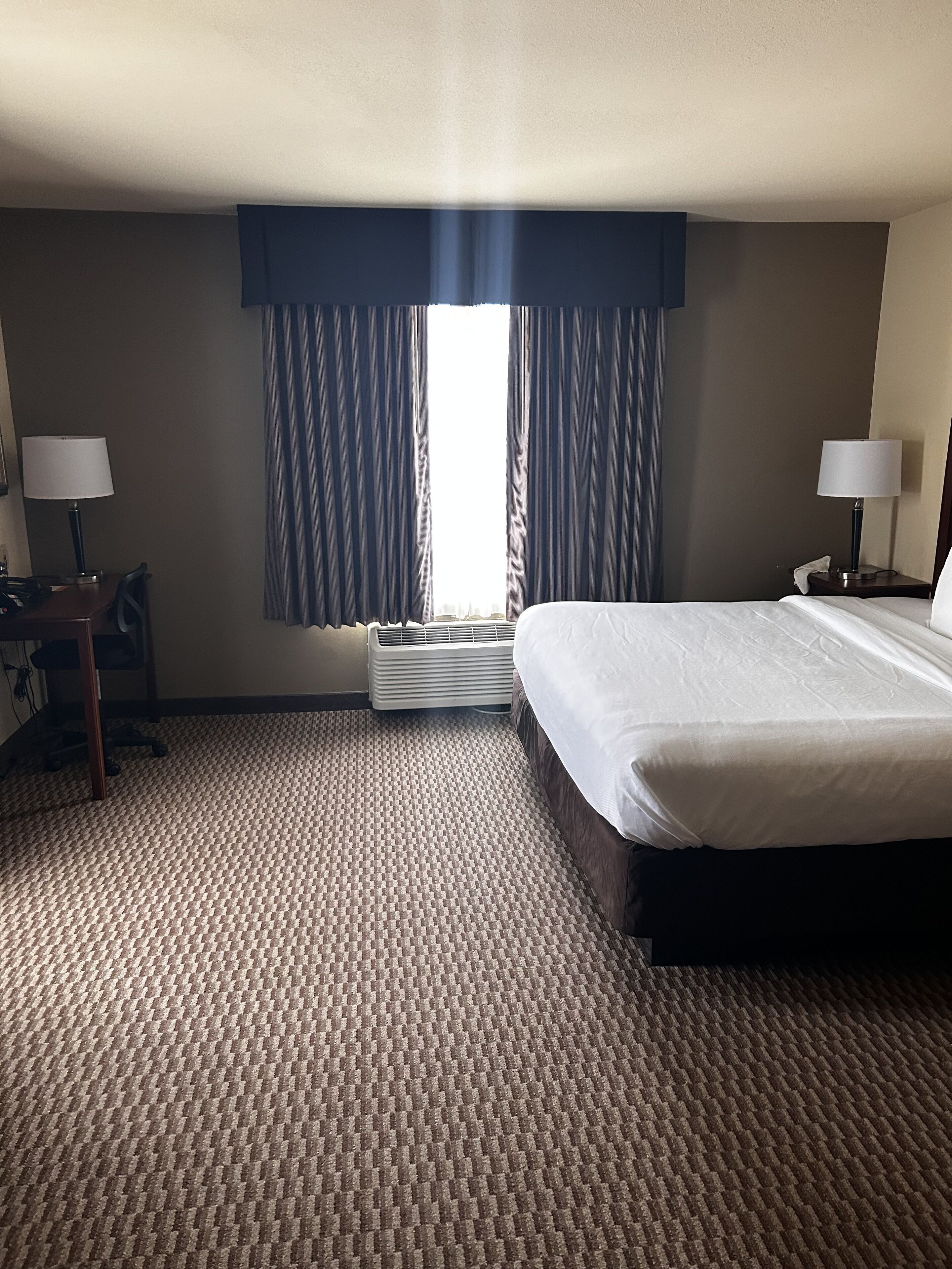 Pillow-top beds, desk, laptop workspace, blackout curtains