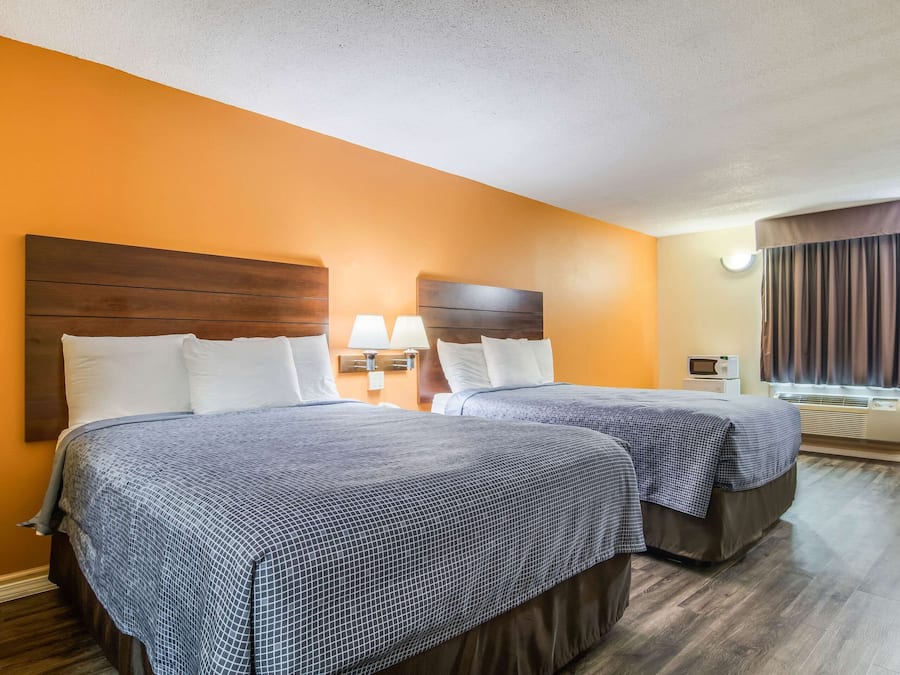 Room, 2 Queen Beds, Non Smoking | Desk, laptop workspace, free WiFi, bed sheets