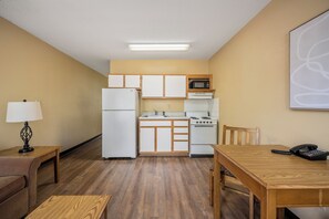 Standard Suite | Private kitchen | Full-size fridge, microwave, stovetop, coffee/tea maker