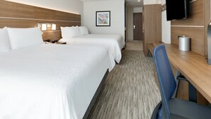 A hotel room with two beds, a desk, a chair, a television, and a framed picture on the wall. - Holiday Inn Express & Suites San Antonio NW near SeaWorld by IHG (San Antonio)