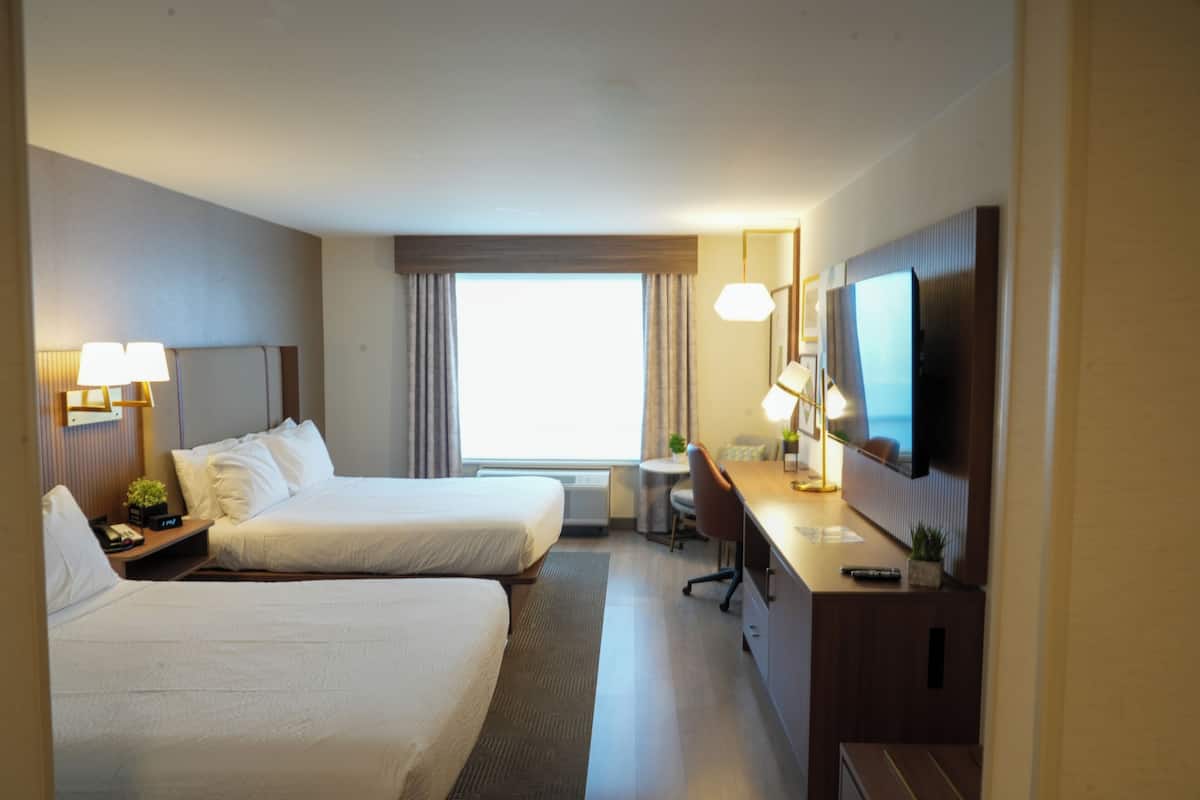 Desk, laptop workspace, blackout drapes, iron/ironing board