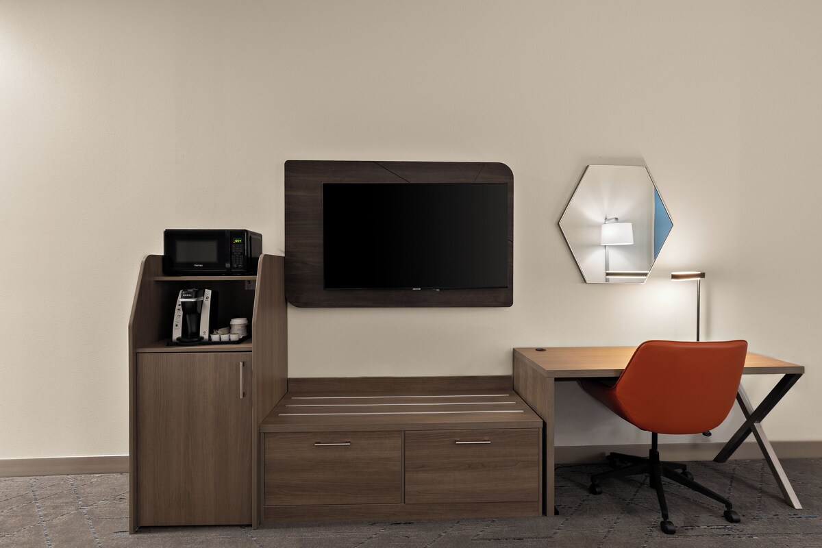 Desk, laptop workspace, blackout curtains, iron/ironing board