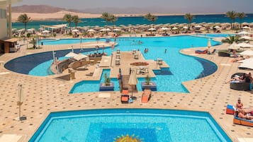 5 outdoor pools, pool umbrellas, pool loungers