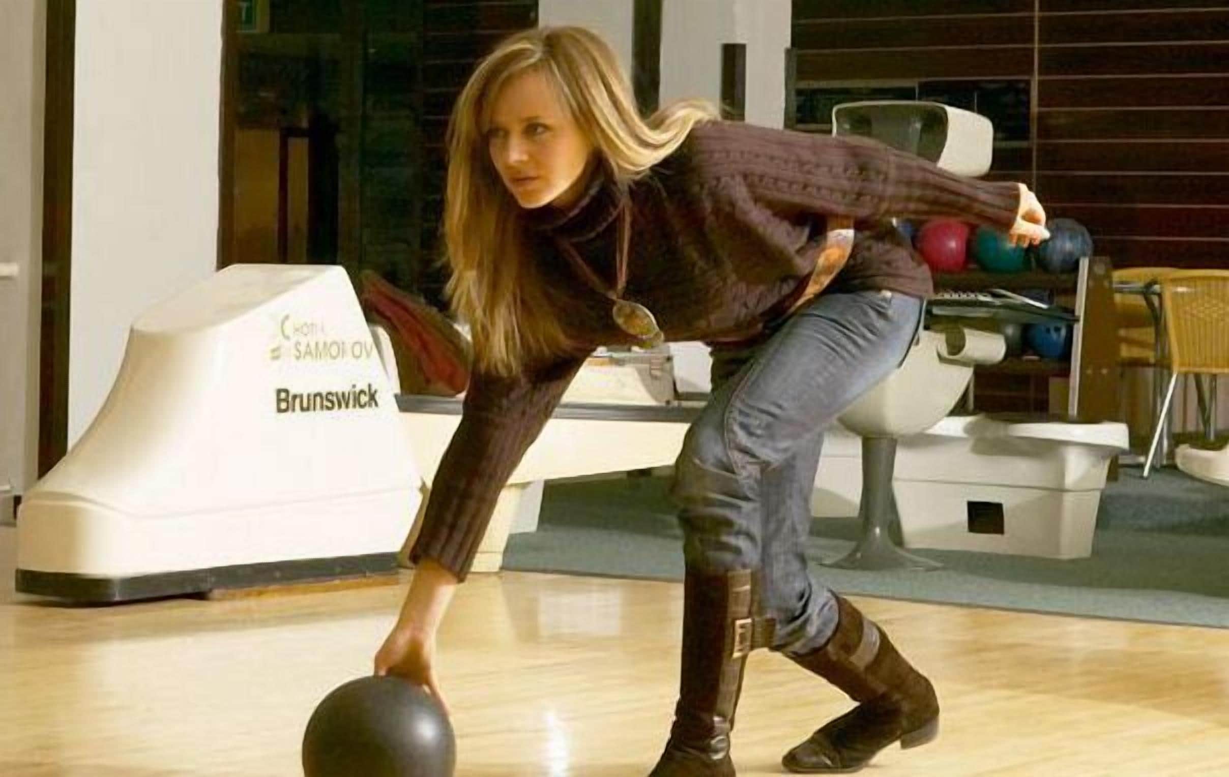 A bowling alley with a Brunswick bowling ball return.