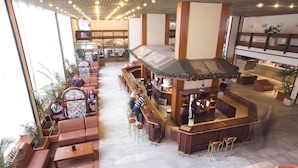 A spacious lobby with a billiard table, seating areas, and a bar. - Hotel Samokov (Samokov)