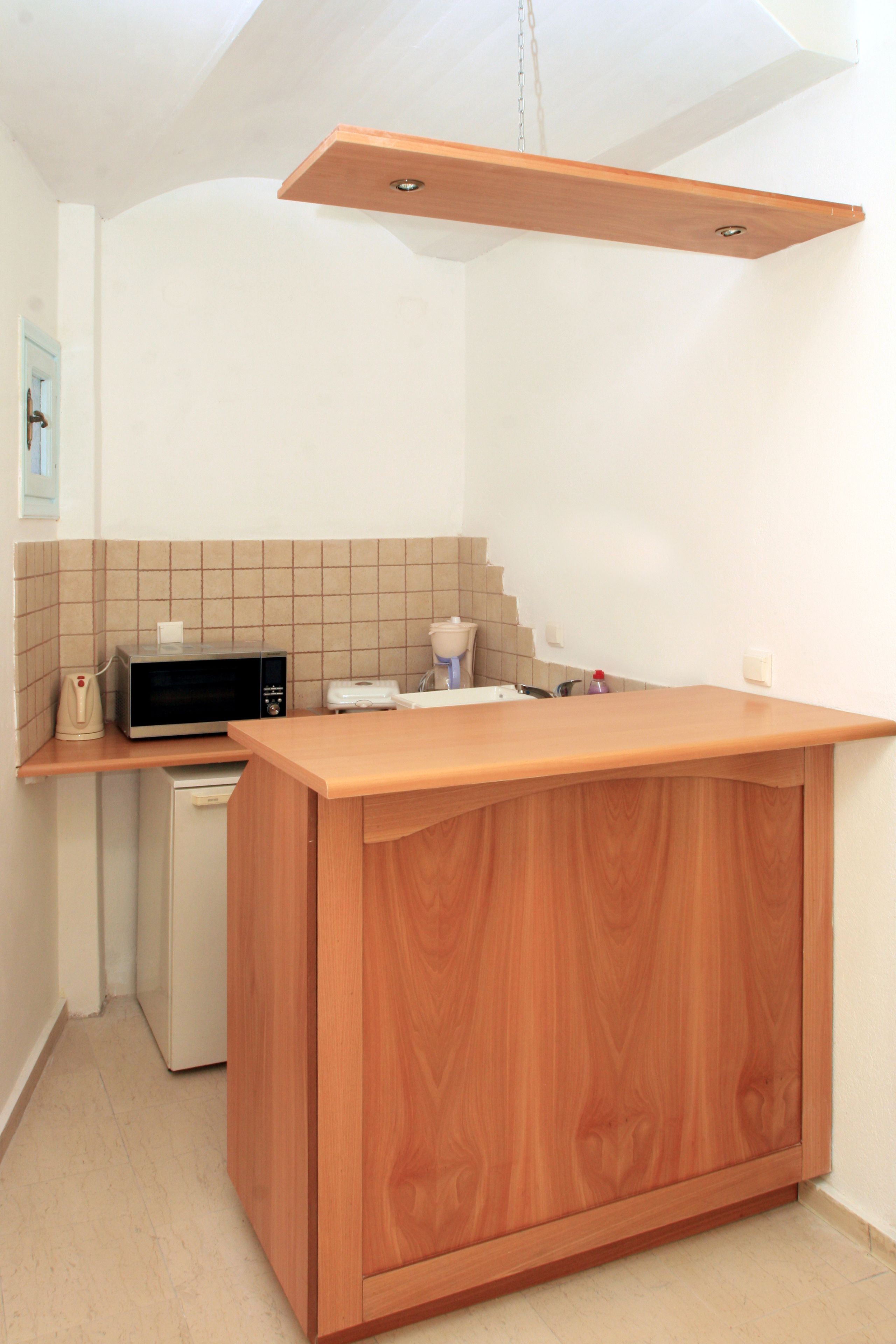 family room, kitchenette | private kitchenette | full-sized fridge, coffee/tea maker, electric kettle