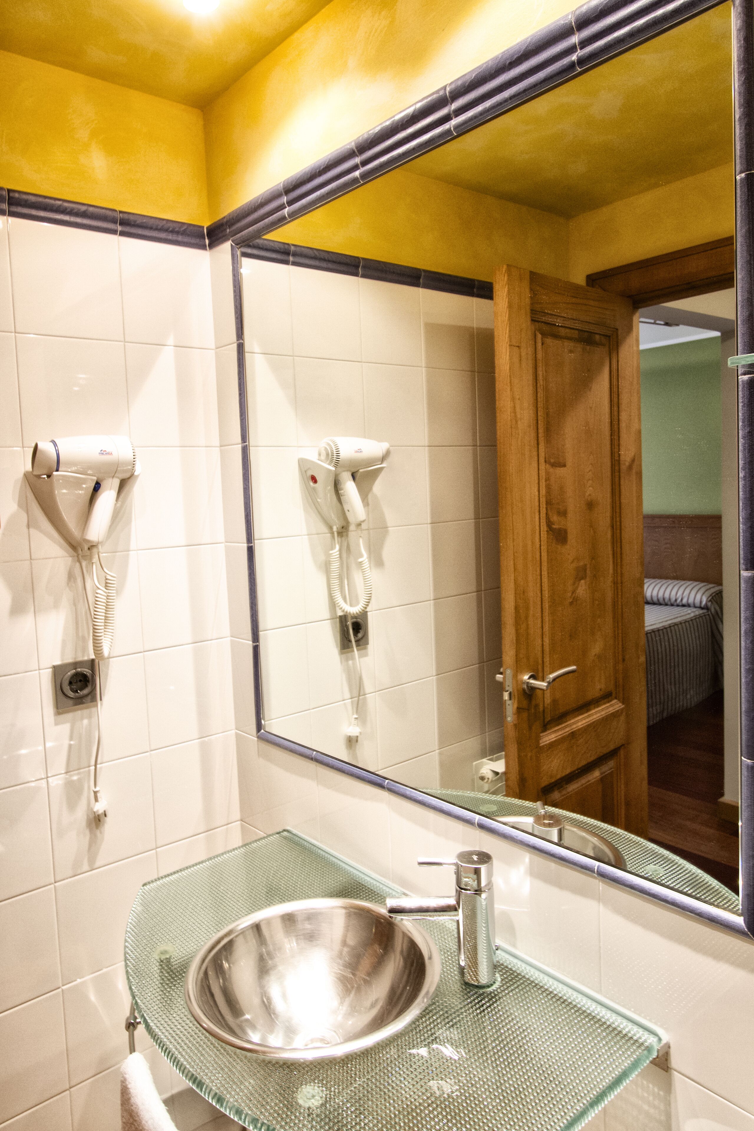 superior room | bathroom | designer toiletries, hair dryer, towels