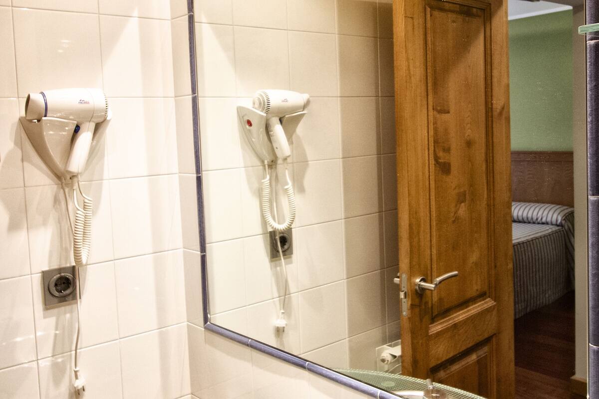 superior room | bathroom | designer toiletries, hair dryer, towels