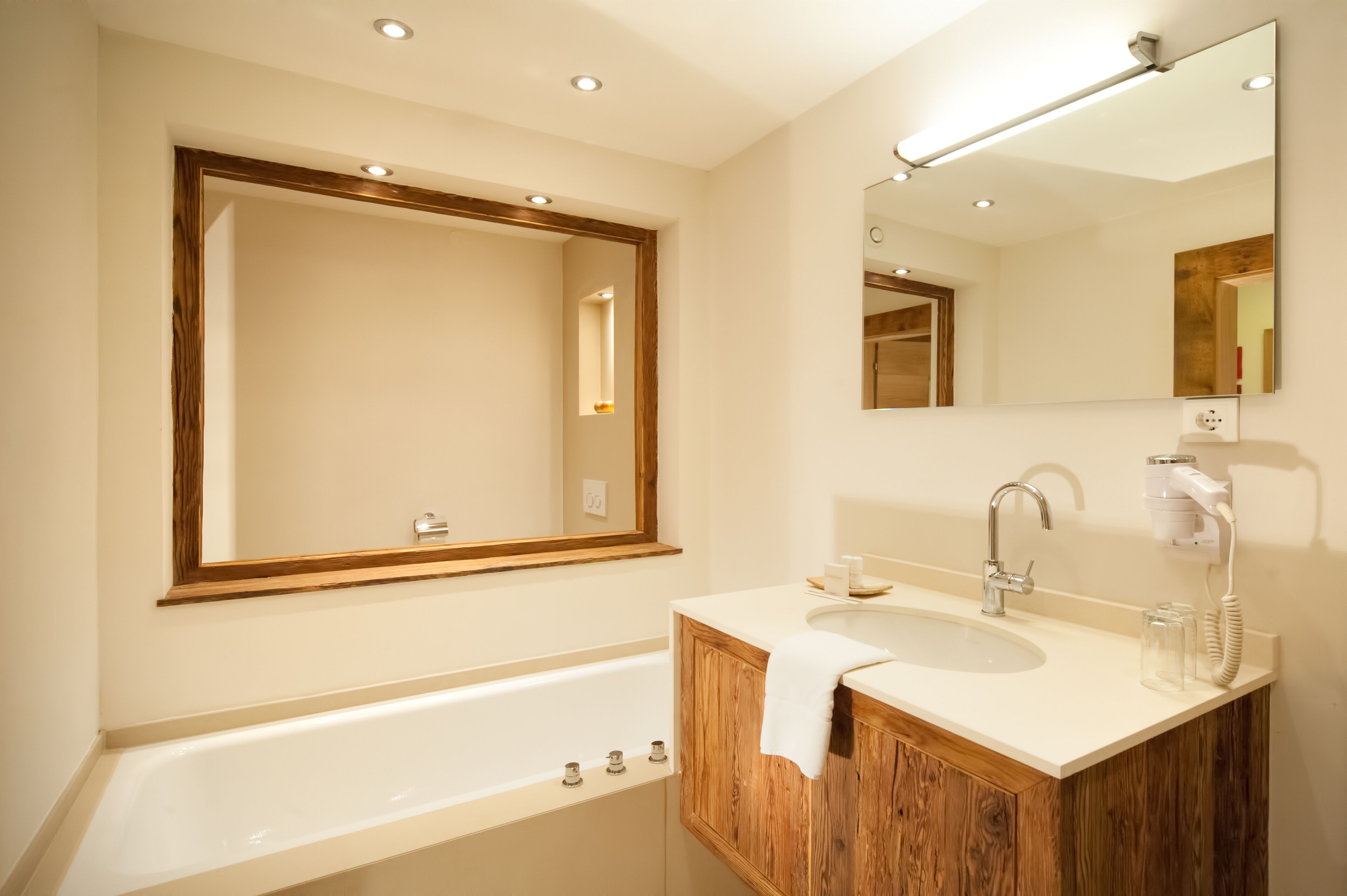 classic suite | bathroom | rainfall showerhead, hair dryer, towels