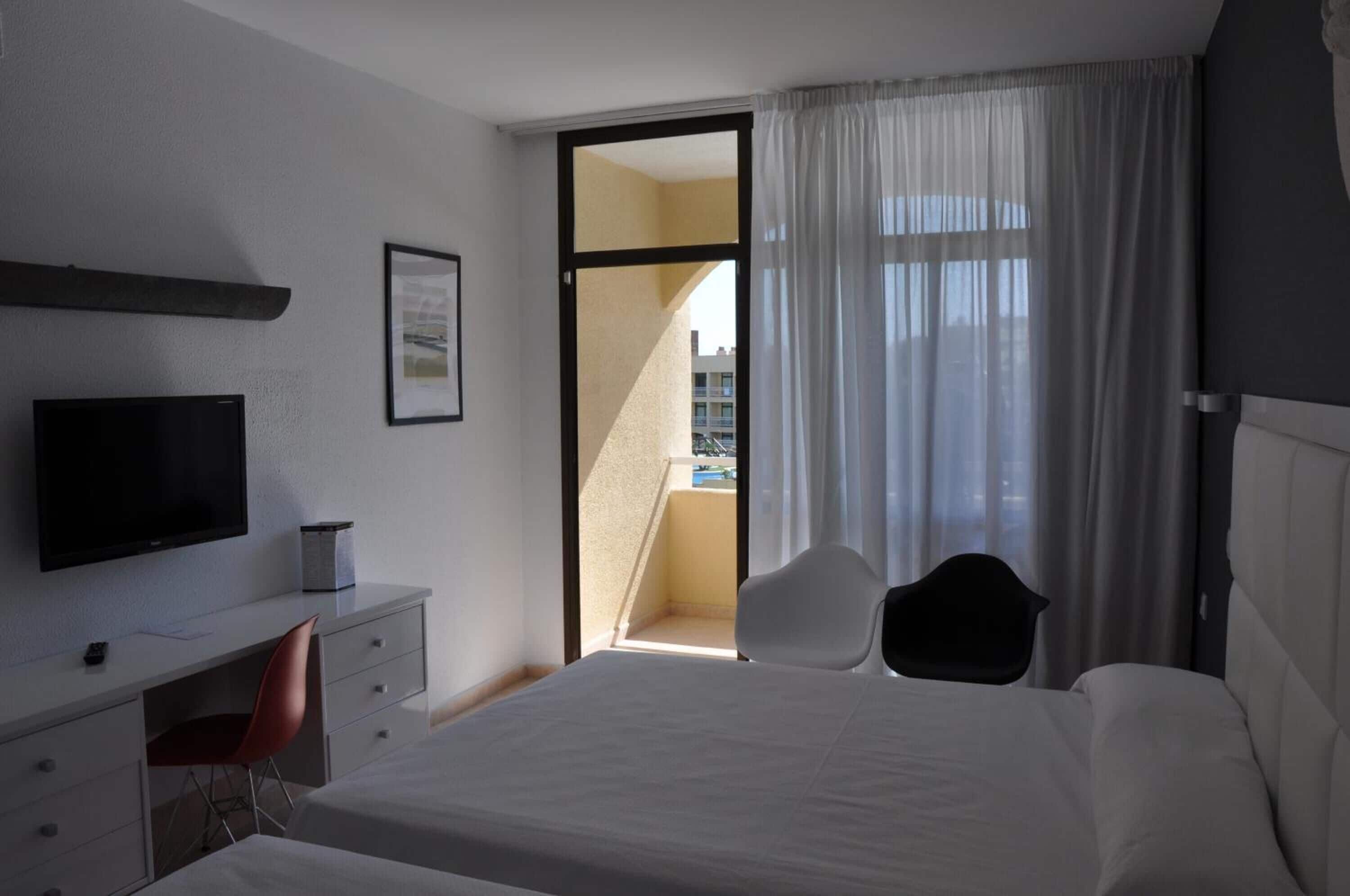 desk, blackout curtains, soundproofing, cots/infant beds