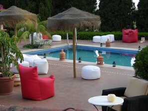 Outdoor pool, pool umbrellas, sun loungers