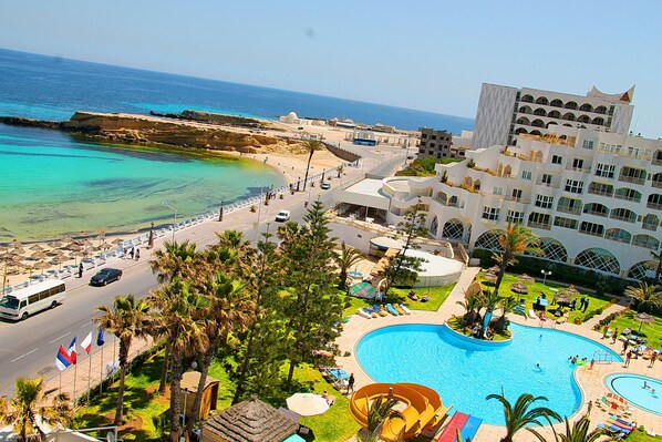 Indoor pool, seasonal outdoor pool, pool umbrellas, sun loungers
