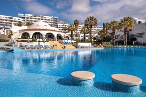 Indoor pool, outdoor pool, pool umbrellas, pool loungers
