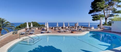 Outdoor pool, pool umbrellas, pool loungers