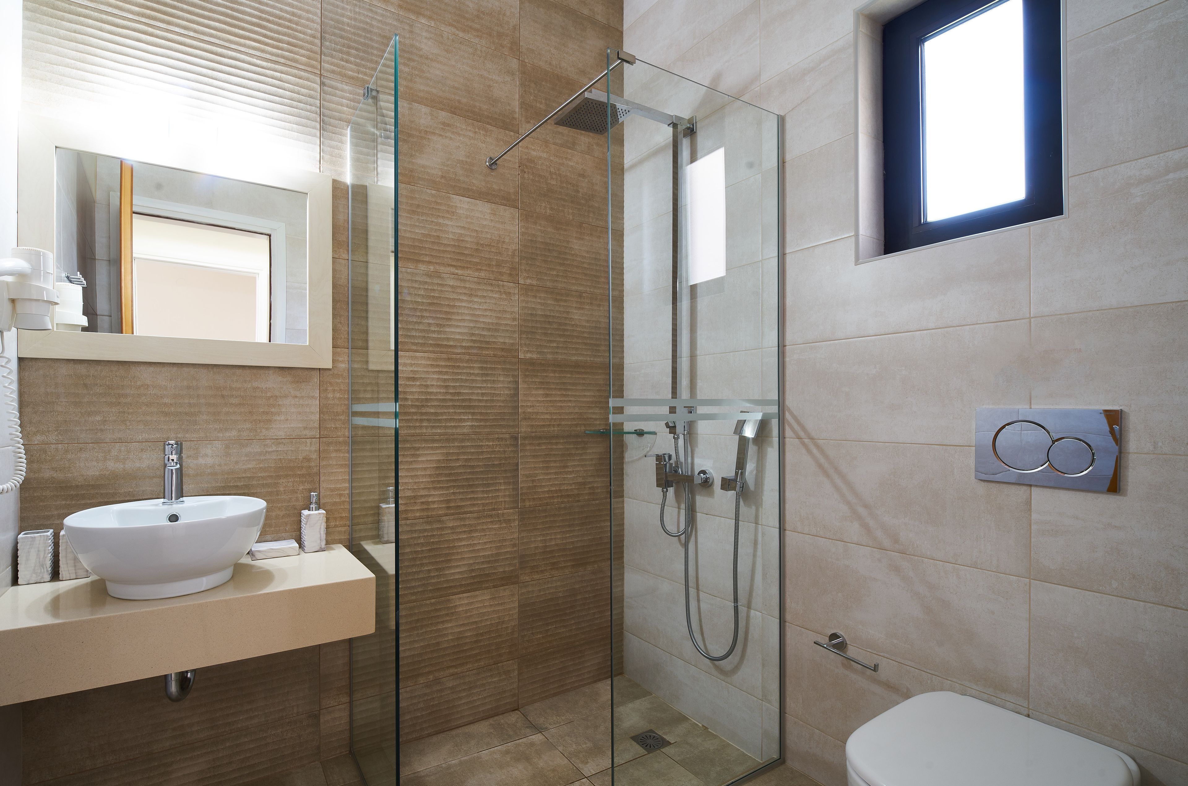 shower, rainfall showerhead, hair dryer, towels