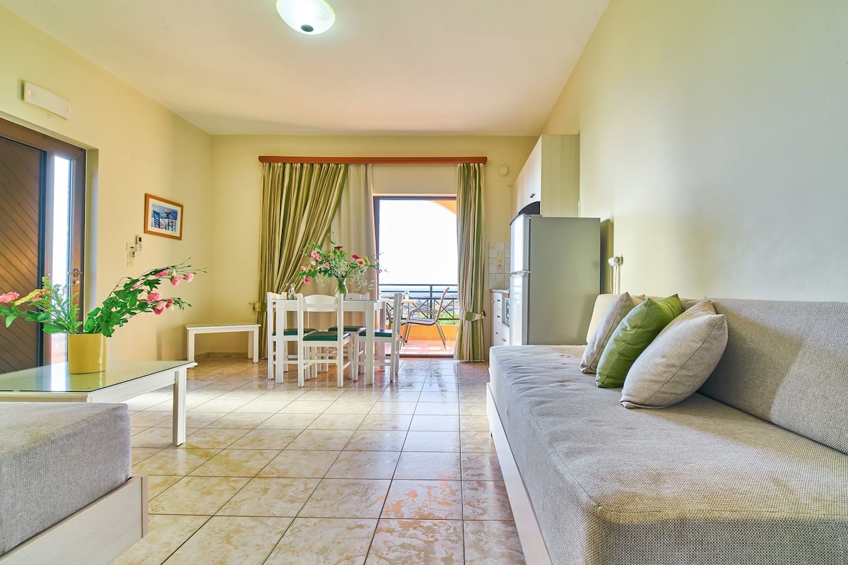 family apartment, 1 bedroom, beach view | 1 bedroom, in-room safe, desk, blackout curtains