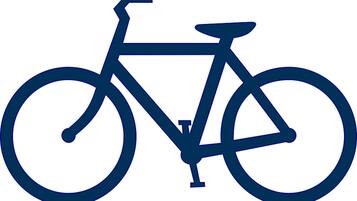 A simple line drawing of a bicycle.