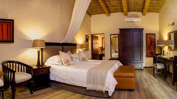 Luxe beddengoed, een minibar, een kluis op de kamer, geluiddichte muren