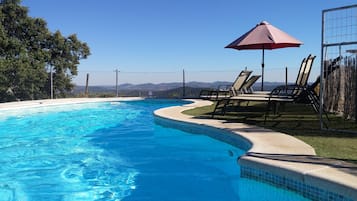 Seasonal outdoor pool, pool umbrellas