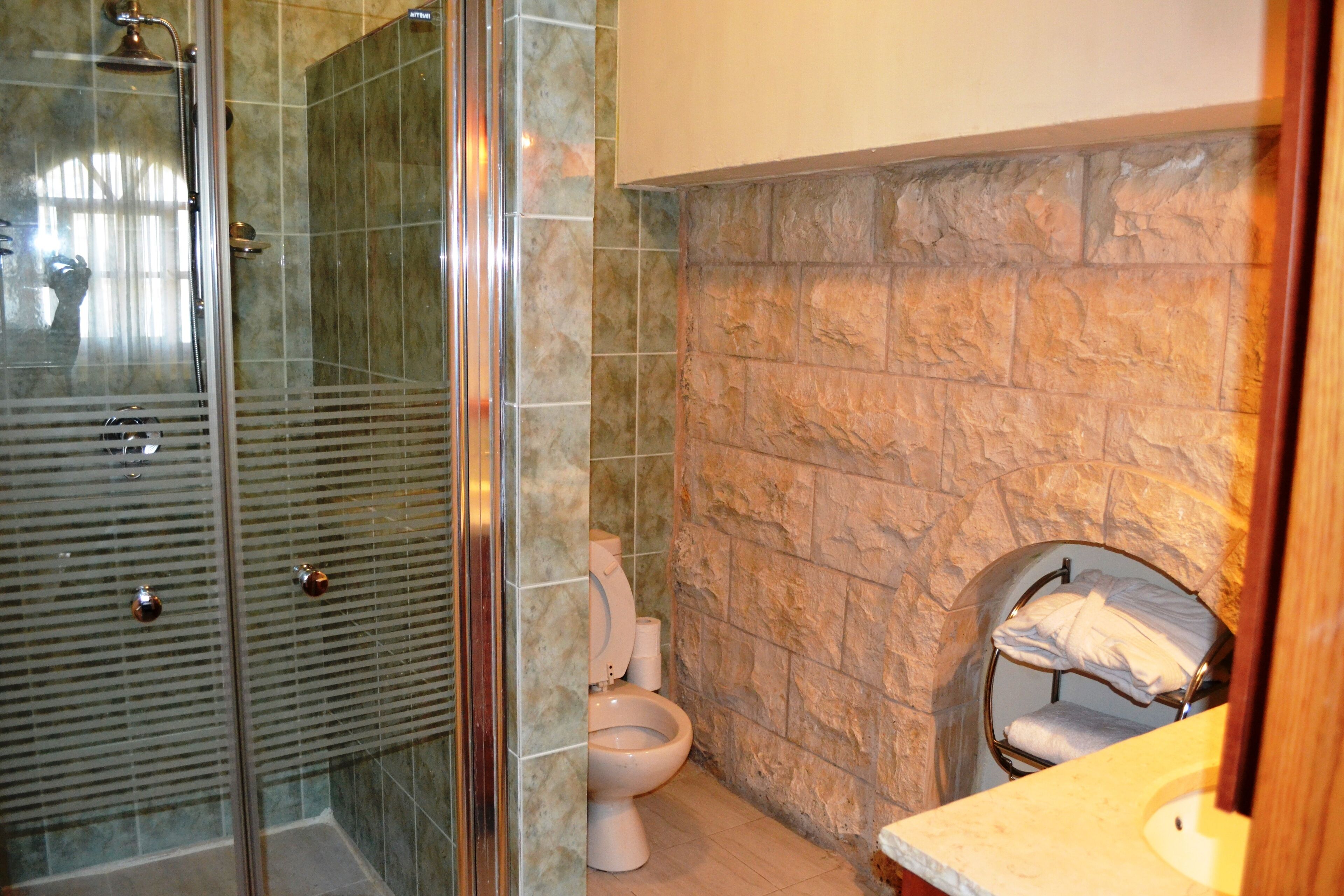 hair dryer, dressing gowns, slippers, towels