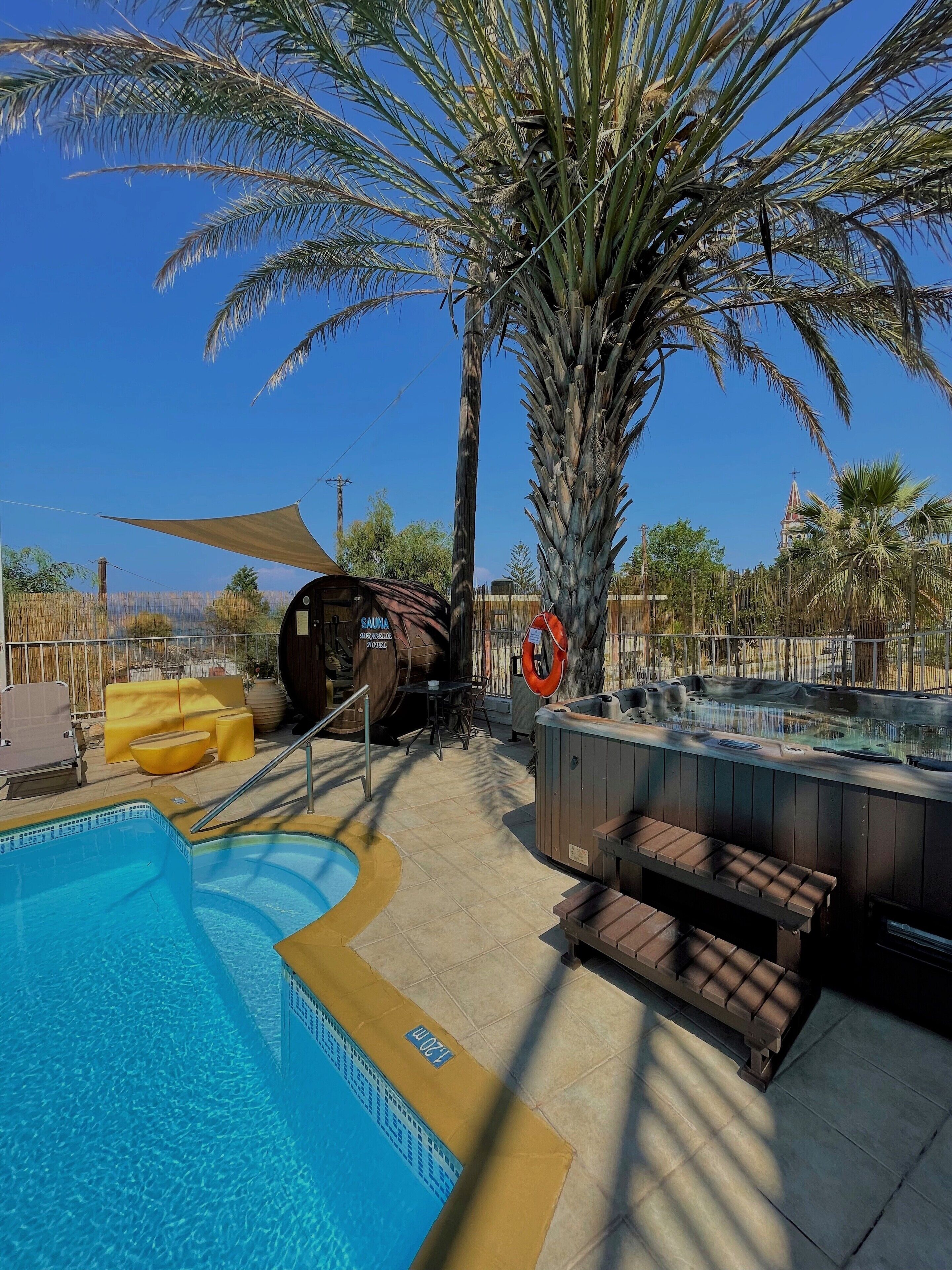 Seasonal outdoor pool, pool umbrellas, pool loungers