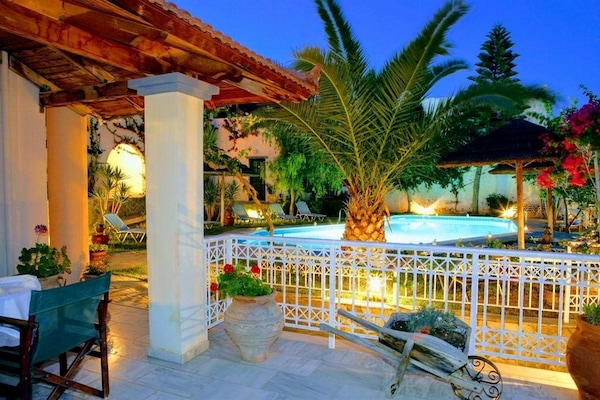 Outdoor pool, pool umbrellas, sun loungers