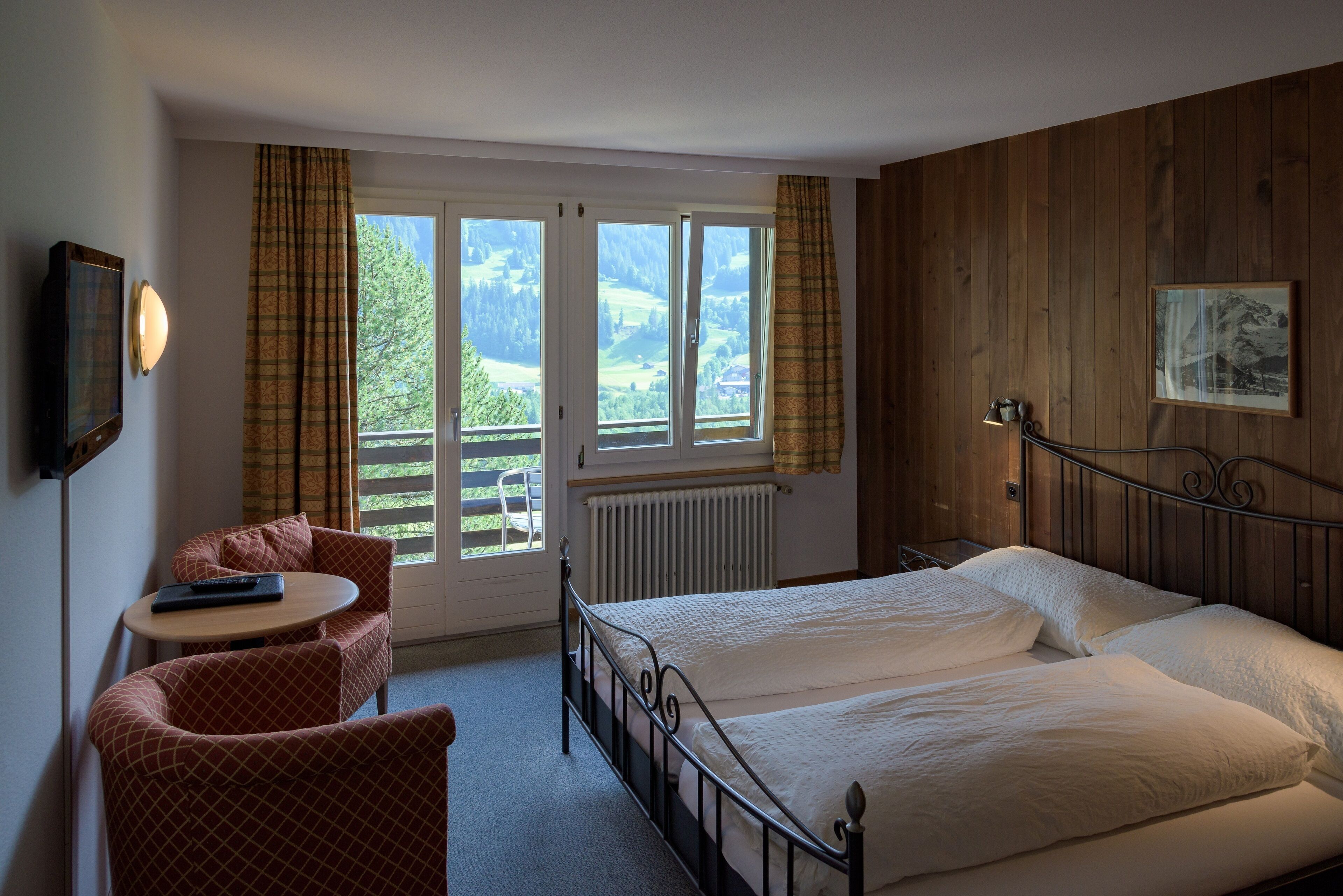 Panoramic Double Room, Balcony, Mountain View (Eiger) | Down comforters, individually decorated, individually furnished, desk